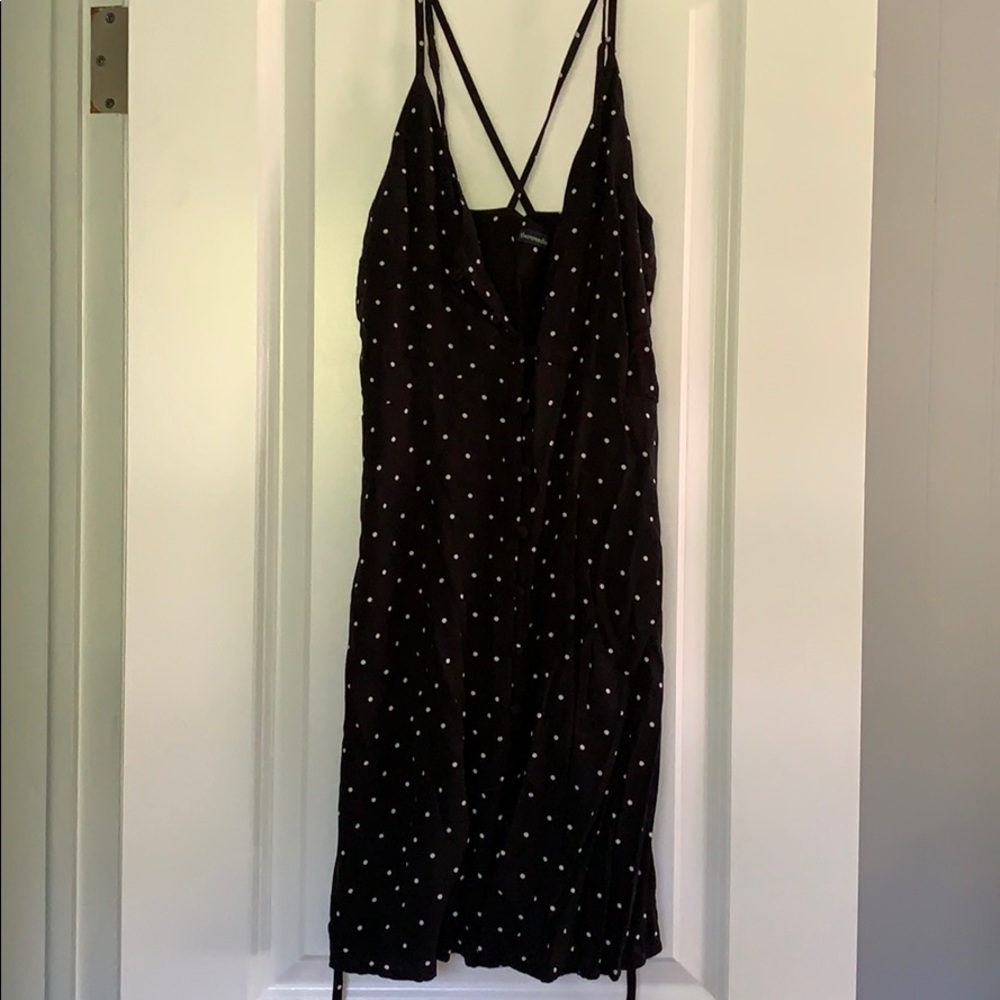 Strappy black polka dot mini dress